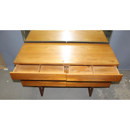 2 - A retro Uniflex 6 drawer dressing table with mirror, approx 121cm wide x 46cm deep x 125cm tall