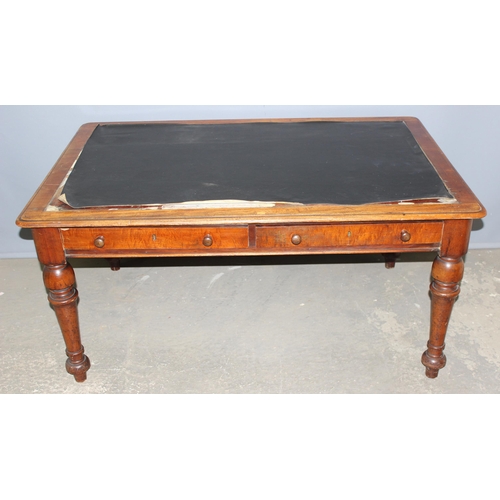 12 - A Victorian mahogany 2 drawer library table or desk with leather top, approx 138cm wide x 90cm deep ... 