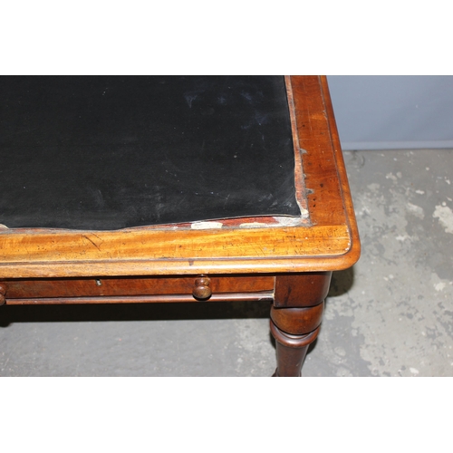 12 - A Victorian mahogany 2 drawer library table or desk with leather top, approx 138cm wide x 90cm deep ... 