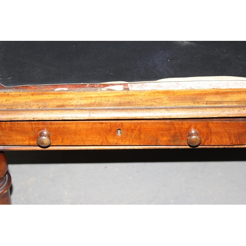 12 - A Victorian mahogany 2 drawer library table or desk with leather top, approx 138cm wide x 90cm deep ... 