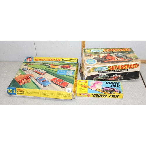 1512 - Matchbox M-1 Motorway set, a Scalextric C547 set in box and a Hot Wheels Chute Pak (3)