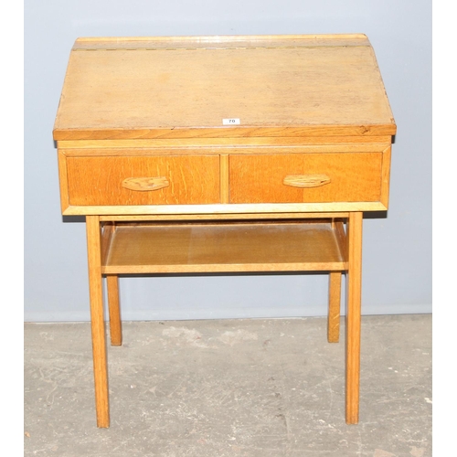 141 - Jack Berry of Wallingford, a bespoke made mid 20th century light oak desk with 2 drawers, in the sty... 