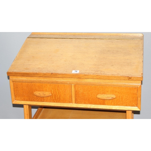 141 - Jack Berry of Wallingford, a bespoke made mid 20th century light oak desk with 2 drawers, in the sty... 