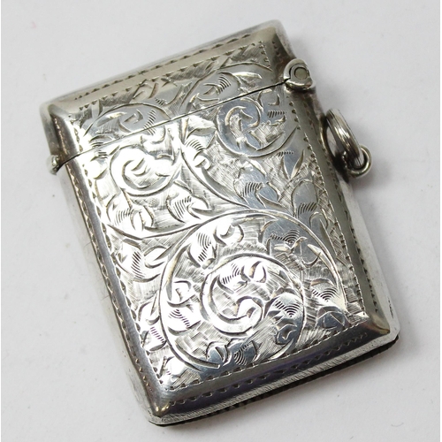 1019 - An antique silver vesta case with acanthus scroll engraving, Birmingham 1904 by Thomas James Skelton... 