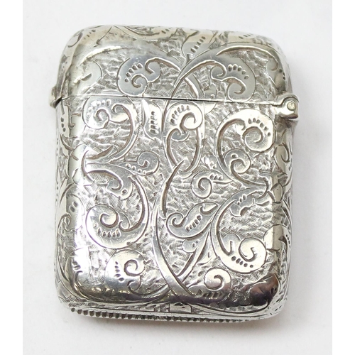 1020 - An antique silver vesta case with acanthus scroll engraving, Birmingham 1904 by Cornelius Desormeaux... 