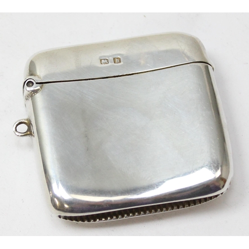 1024 - An antique silver vesta case plain design and slightly curved form, Birmingham 1907 by G Loveridge &... 