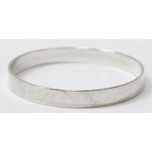 1111 - Silver cuff bangle, marked for London 2000, approx 22.85g gross