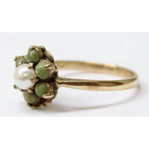 1129 - 9ct gold floral set ring with central seed pearl, approx size Q, approx 2.71g gross