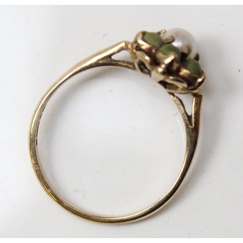 1129 - 9ct gold floral set ring with central seed pearl, approx size Q, approx 2.71g gross