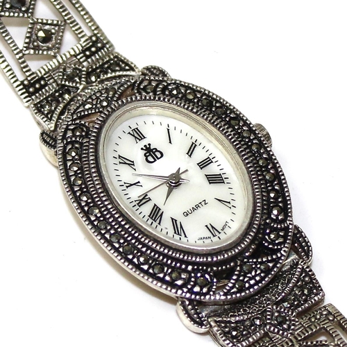 1318 - An Art Deco style silver marcasite cocktail watch by Brooks & Bentley, boxed