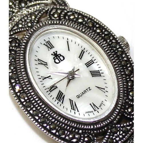 1318 - An Art Deco style silver marcasite cocktail watch by Brooks & Bentley, boxed