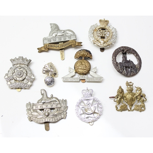 1417 - 9 assorted military cap badges and others to include Lincolnshire, Lancashire Fusiliers, Royal Engin... 