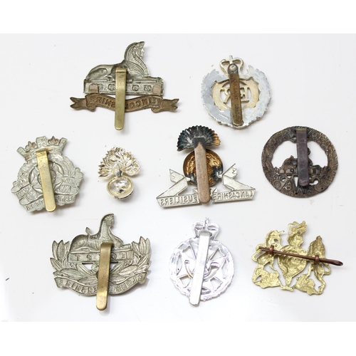 1417 - 9 assorted military cap badges and others to include Lincolnshire, Lancashire Fusiliers, Royal Engin... 