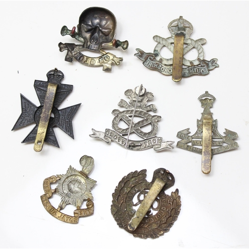 1418 - 7 assorted military cap badges and others to include South & North Staffordshire, Royal Engineers, R... 