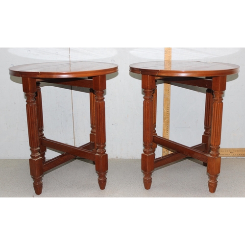 143 - Pair of wooden circular folding tables, approx 48cm H x 43cm W x 43cm D