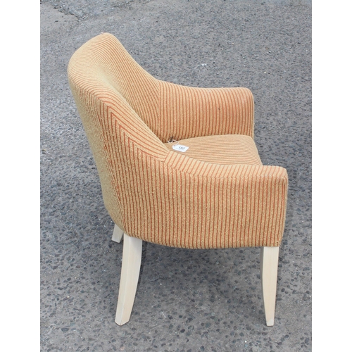 162 - A pair of retro tub chairs with striped 