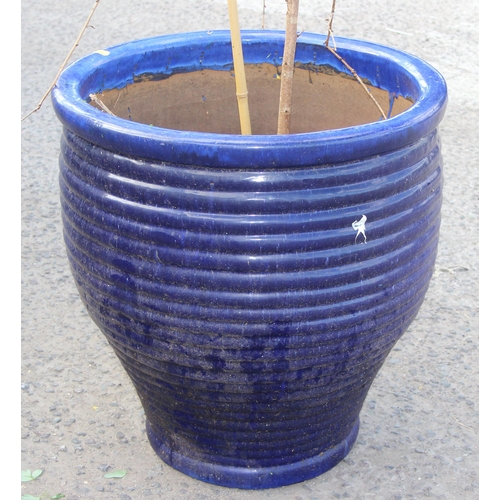 304A - A large blue glazed ribbed garden pot, approx 59cm wide x 60cm tall