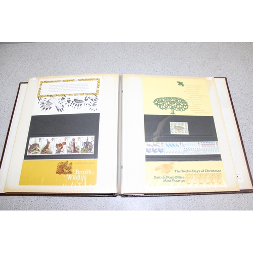 571A - An album of pre-decimal and 1970's presentation pack stamps, all unused