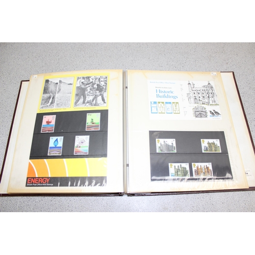 571A - An album of pre-decimal and 1970's presentation pack stamps, all unused