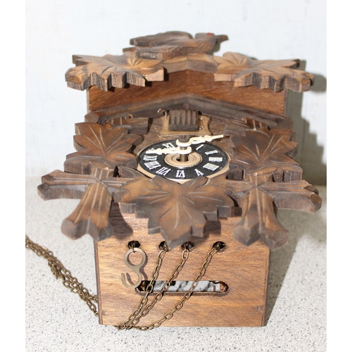 1316A - Vintage August Schwer West German cuckoo clock with carved wooden design