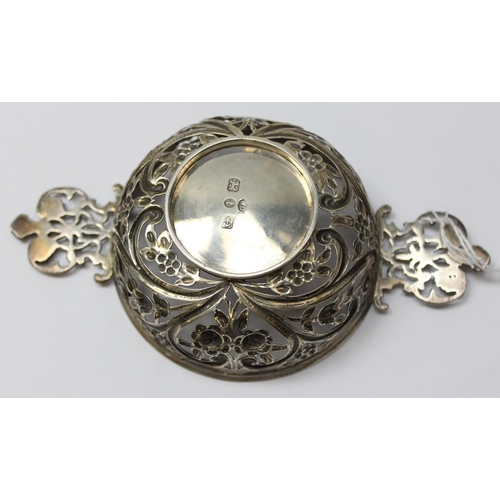 1006 - An early 20th century silver bonbon dish in the form of a pierced quaich, Birmingham 1893 by William... 