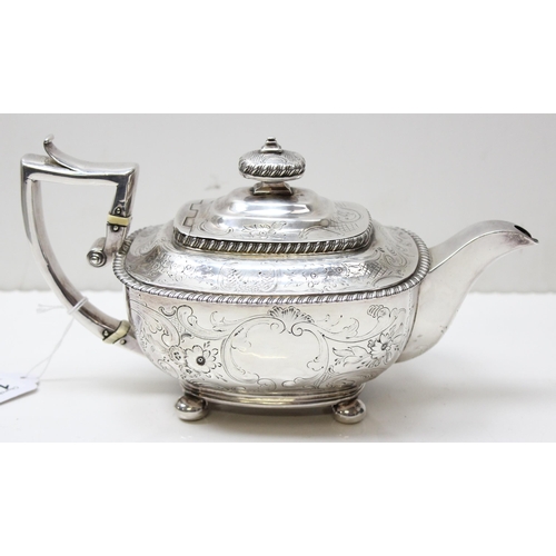 1001 - A George III period silver tea pot with engraved and embossed floral decoration, London 1814 by Char... 