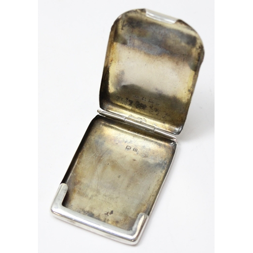 1061 - An Art Deco silver matchbook cover with engine turned decoration, Birmingham 1928, approx 30.21g gro... 