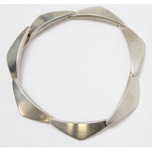 1112 - Georg Jensen of Denmark, a retro style silver bracelet made up of stylised triangular links, marked ... 