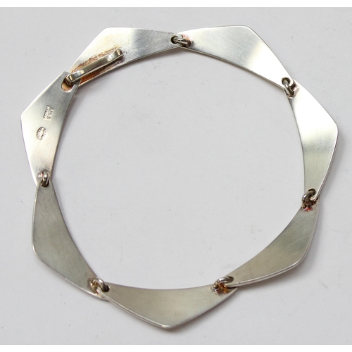 1112 - Georg Jensen of Denmark, a retro style silver bracelet made up of stylised triangular links, marked ... 