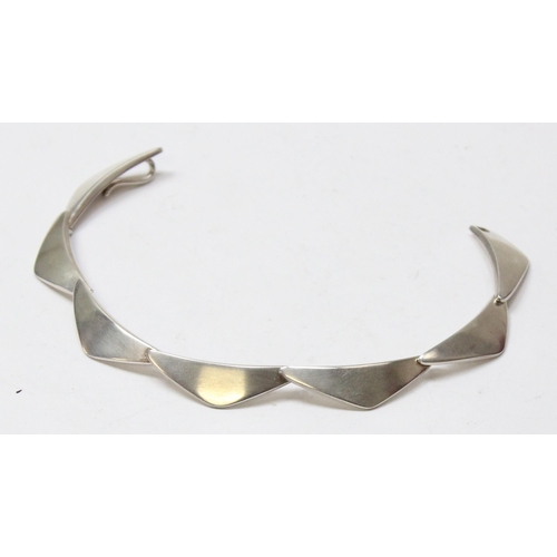 1112 - Georg Jensen of Denmark, a retro style silver bracelet made up of stylised triangular links, marked ... 