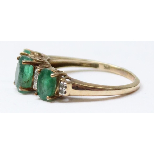 1115 - 9ct gold emerald and diamond trilogy ring, approx size O, approx 2.76g gross