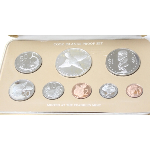 1228 - 1976 Cook Islands silver and other proof coin set, boxed with paperwork, sealed on card, $5 coin XRF... 