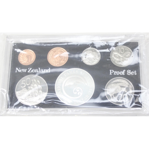 1230 - 1987 New Zealand National Parks Centennial proof coin sets one with silver dollar coin, boxed with p... 