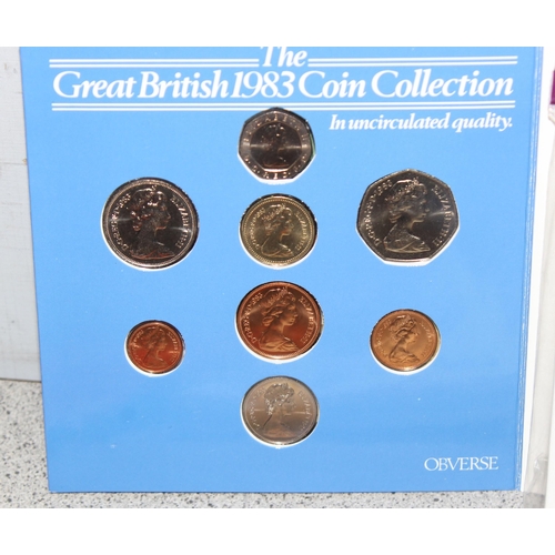 1296 - Qty of coin reference books, a 1983 coin set in case, an Italian silver Papal medallion and a Willia... 