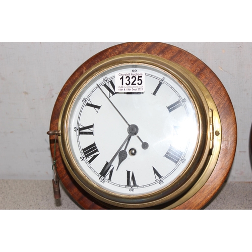 1325 - Vintage brass cased bulk head style mechanical movement wall clock and a similar brass cased bulk he... 