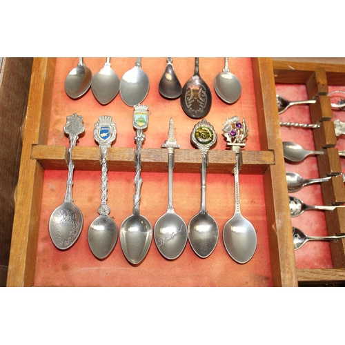 1047A - A large qty of assorted silver plated collectors spoons, spoon display racks, and assorted collector... 