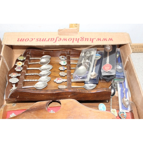 1047A - A large qty of assorted silver plated collectors spoons, spoon display racks, and assorted collector... 