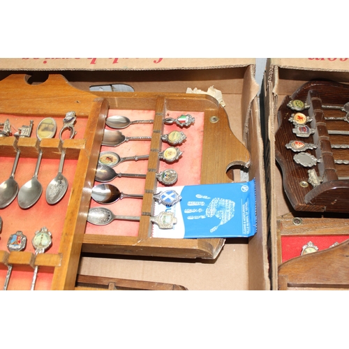 1047A - A large qty of assorted silver plated collectors spoons, spoon display racks, and assorted collector... 