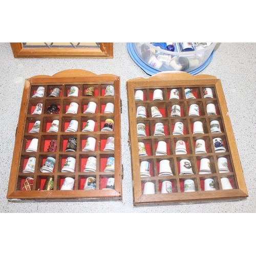 1047A - A large qty of assorted silver plated collectors spoons, spoon display racks, and assorted collector... 