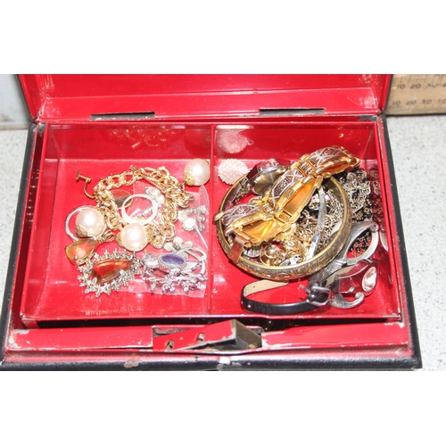 1133 - Qty of assorted mixed costume jewellery in vintage cash tin