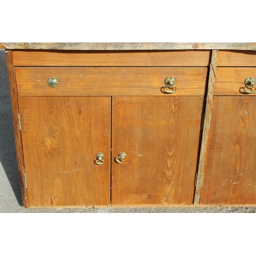 146 - A large vintage hand made rustic elm dresser, plate rack over 2 drawers over 4 cupboard doors, rusti... 