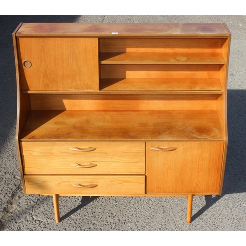 149 - A retro Avalon sideboard with various drawers and shelves, approx 135cm wide x 46cm deep x 135cm tal... 