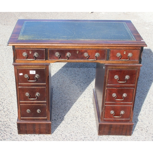 156 - A small vintage leather topped pedestal desk with drop handles, approx 93cm wide x 53cm deep x 78cm ... 