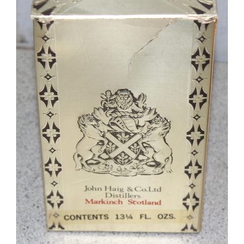 1653 - Vintage bottle of Dimple Haig Scotch Whisky, 13.25 fluid ounces.