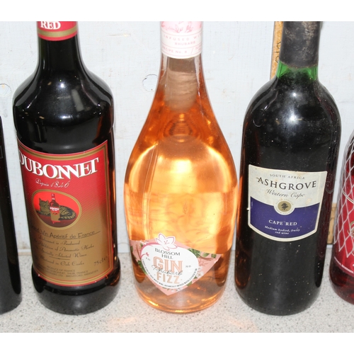 1655 - Mixed lot of alcohol to include Dubonnet & Monterez