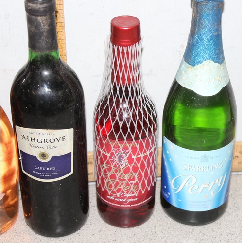 1655 - Mixed lot of alcohol to include Dubonnet & Monterez