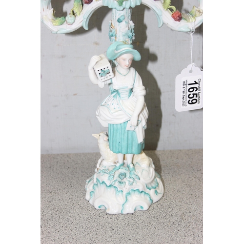 1659 - A Meissen Augustus Rex marked candelabra formed as a girl with bird in cage and a pair of large Faie... 