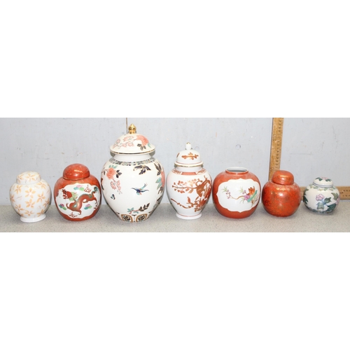 1802 - 7 ginger jars of various designs and sizes, largest approx 26cm tall