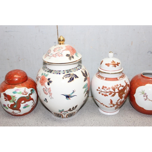 1802 - 7 ginger jars of various designs and sizes, largest approx 26cm tall