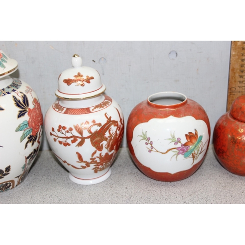 1802 - 7 ginger jars of various designs and sizes, largest approx 26cm tall